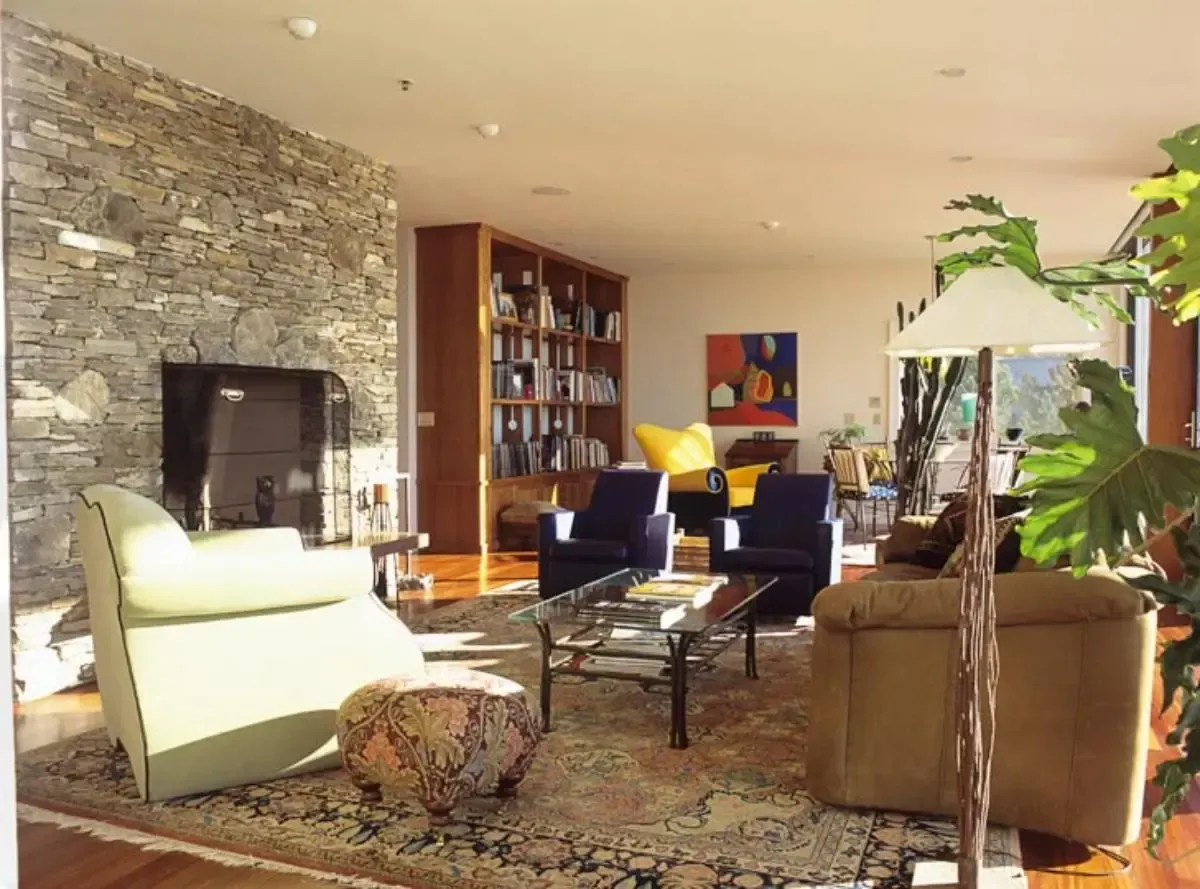 Living room with a fireplace and furnishings