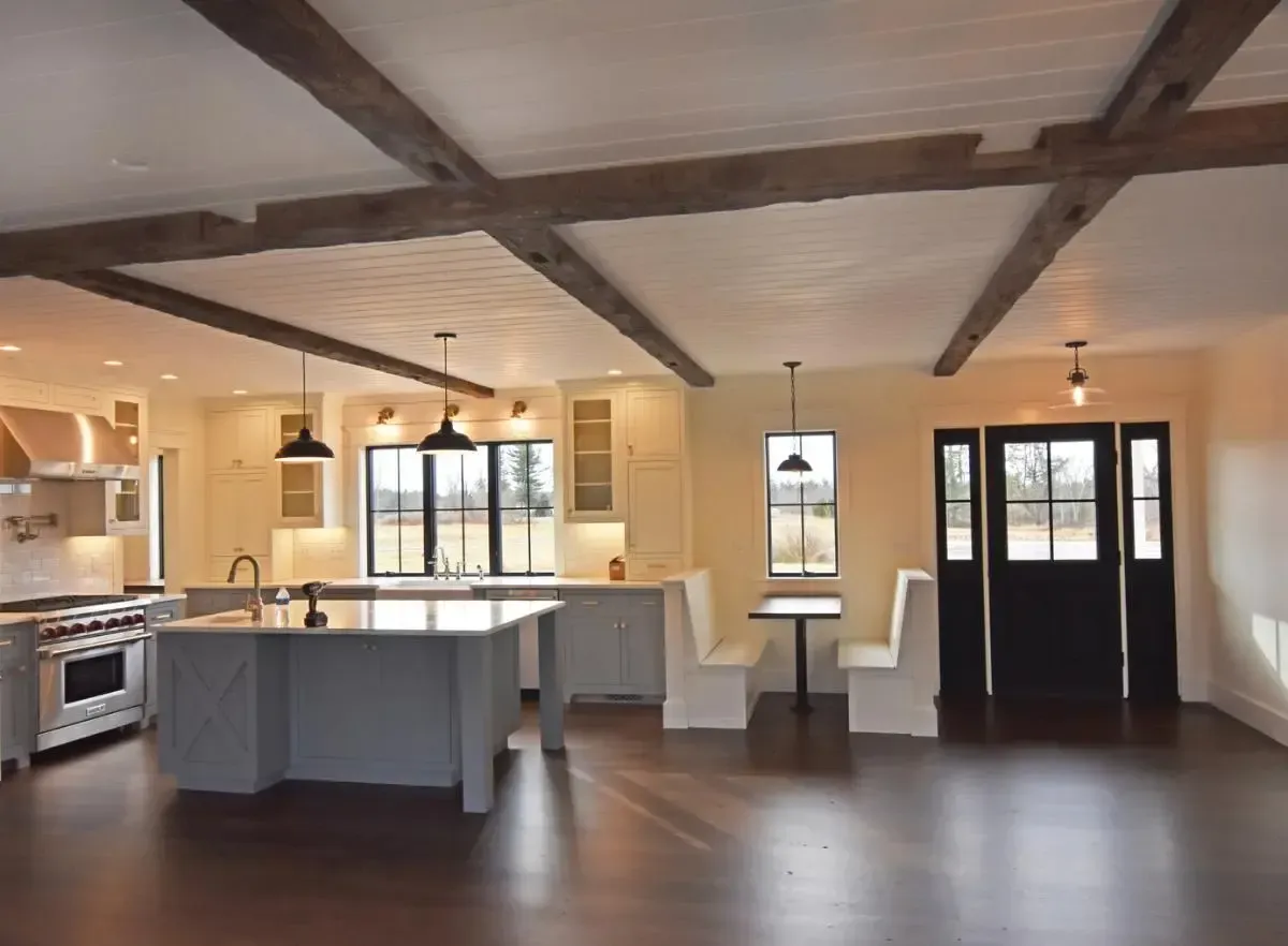 Kitchen with a large island and adjacent dining table