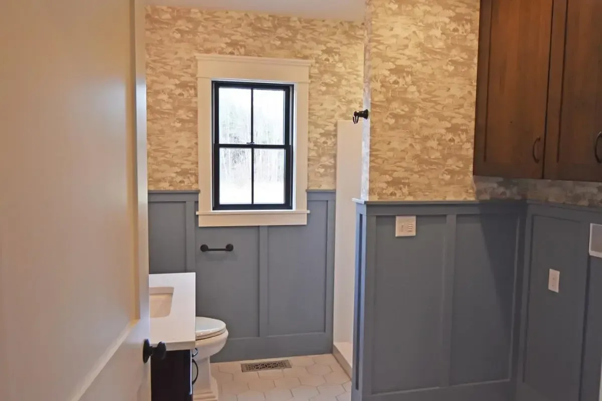 Bathroom with a sink, toilet, and shower