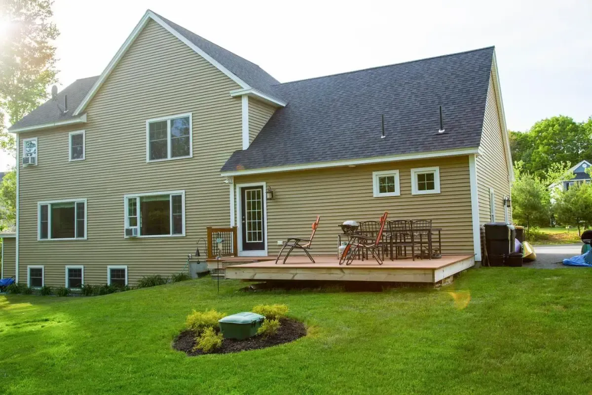 Yellow Colonial with a large rear deck
