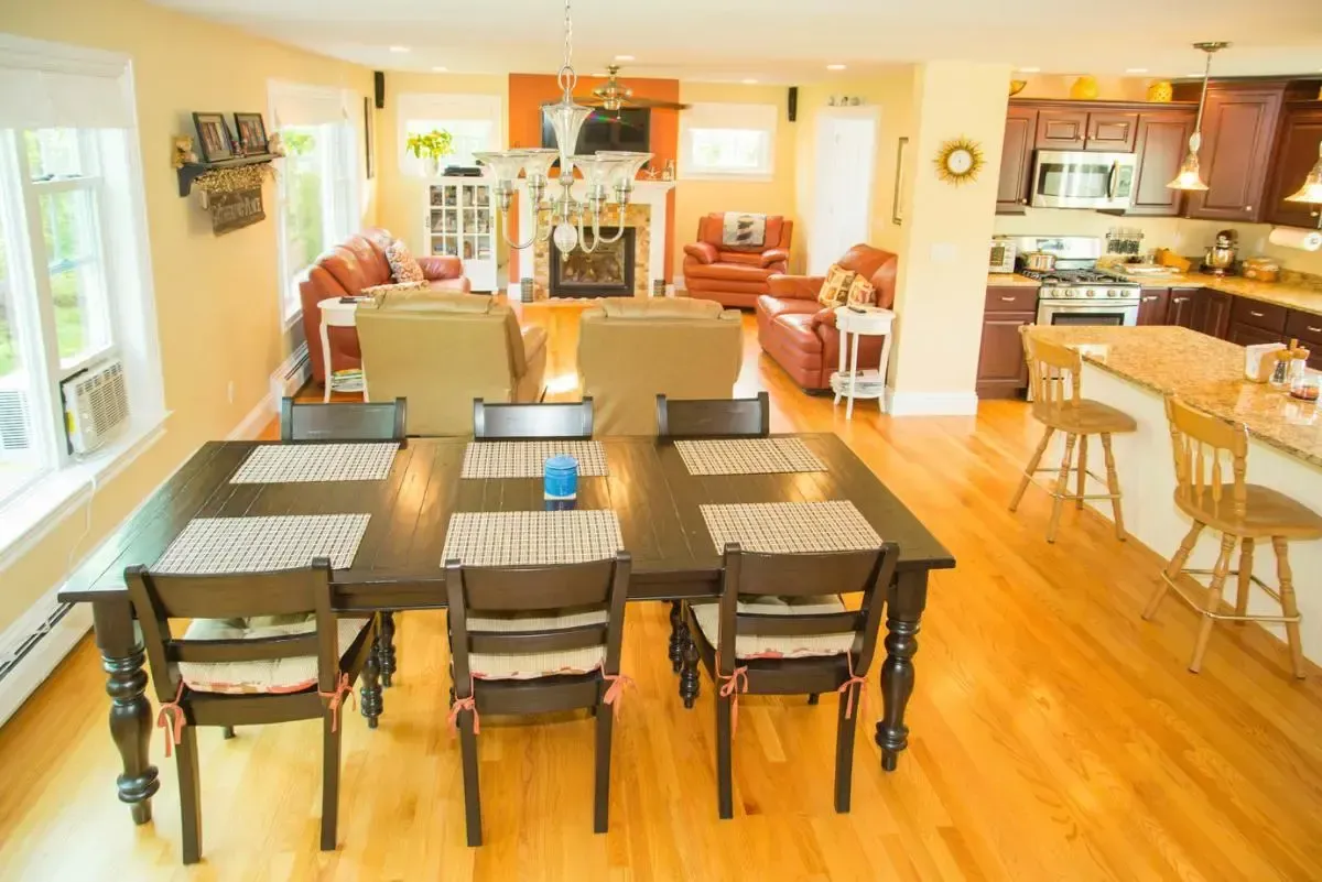 Dining table and chairs centered in the room