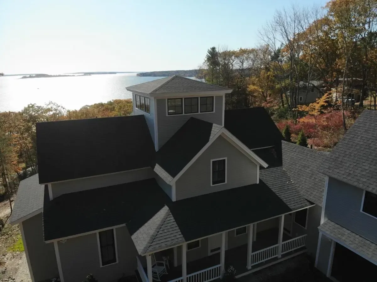 Cumberland cottage home with a broad porch overlooking the water