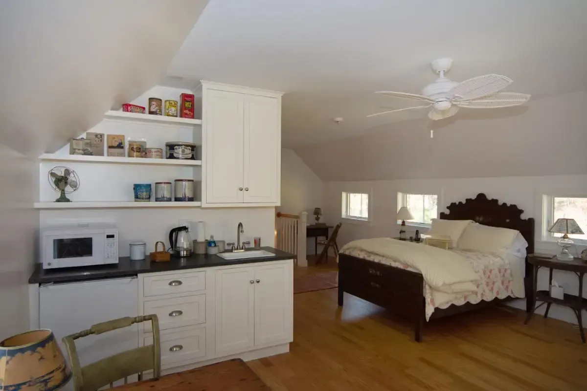 Bedroom with a ceiling fan above the bed
