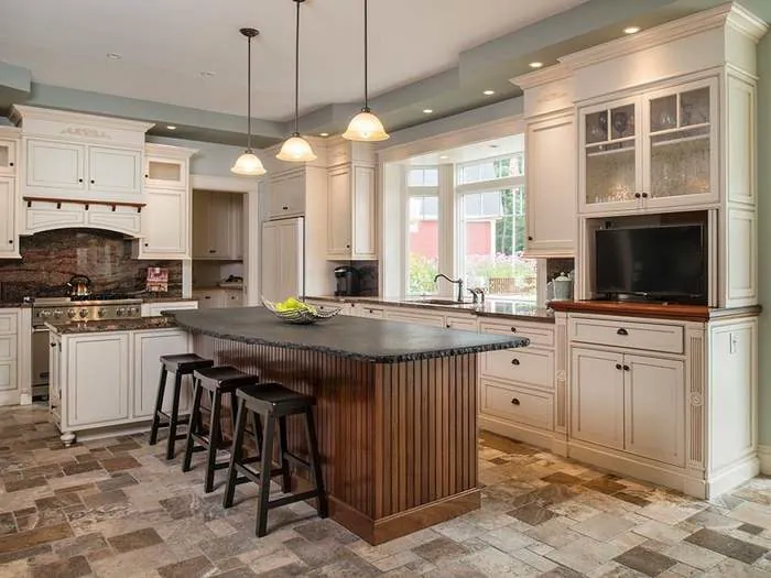 Kitchen and dining area with a large island