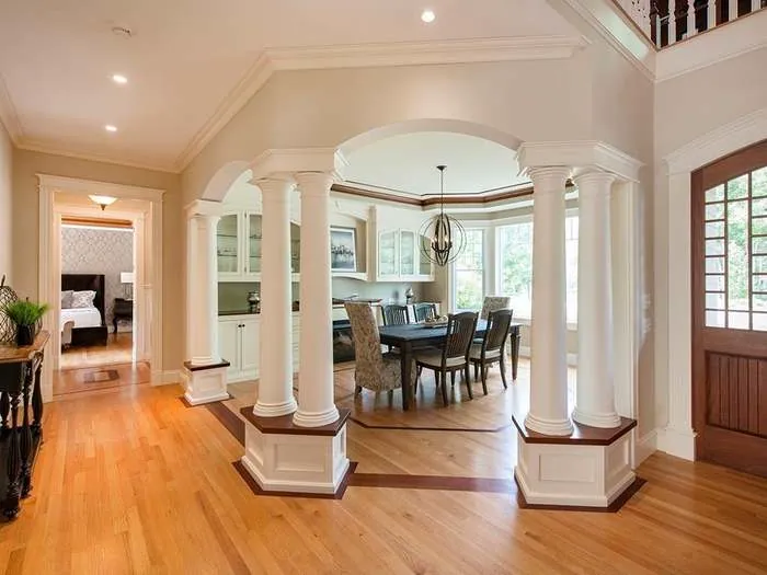 Dining room with custom cabinetry and garden views