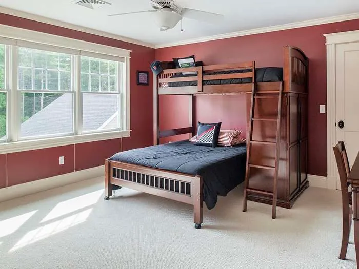 Bunk room with built-in sleeping spaces