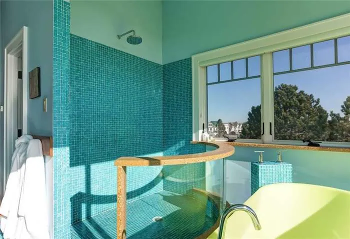 Bright pool room with tile, a soaking tub, and large windows