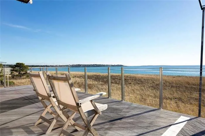 Outdoor sitting area overlooking the water