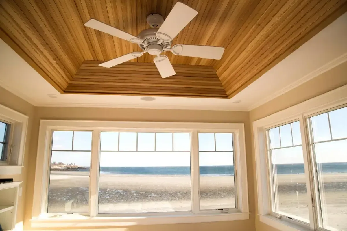 Room with a ceiling fan and ocean views