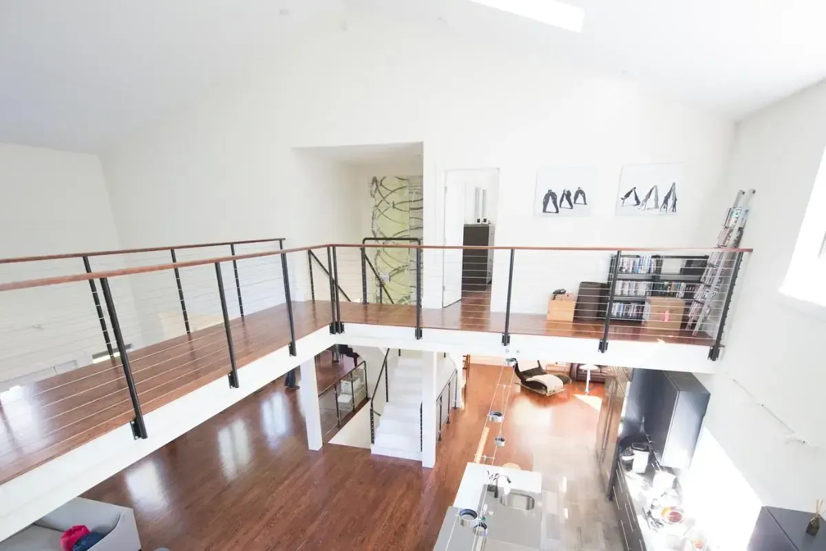 Aerial view of the home’s balcony and exterior stairs