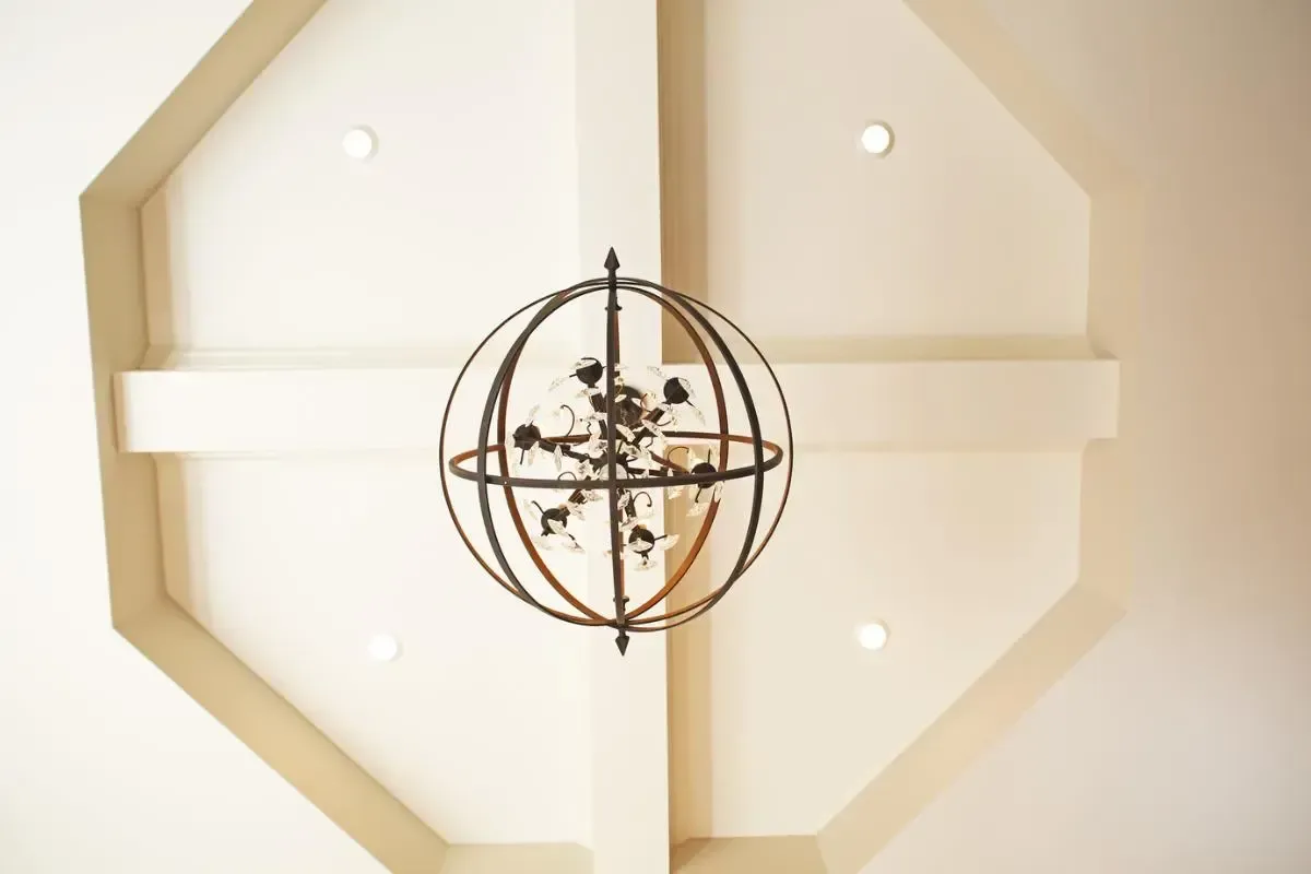 Chandelier centered above the room