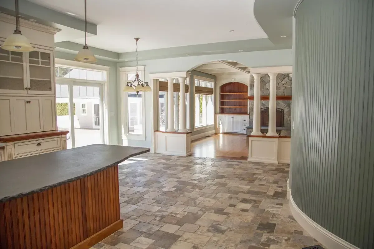 Kitchen with a central island and tiled floor