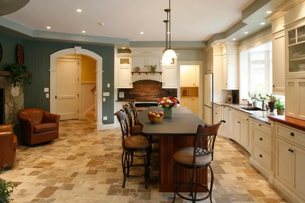 White kitchen cabinetry around a large island