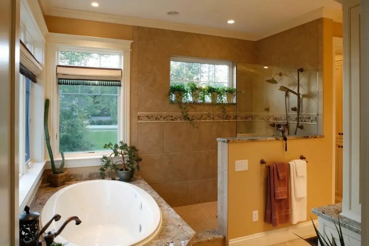 Bathroom with a tub and separate walk-in shower