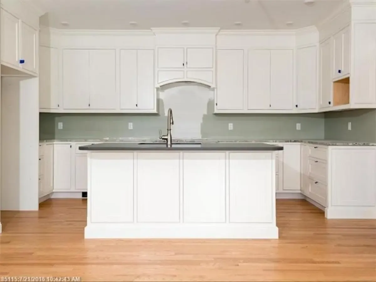White kitchen with a large central island