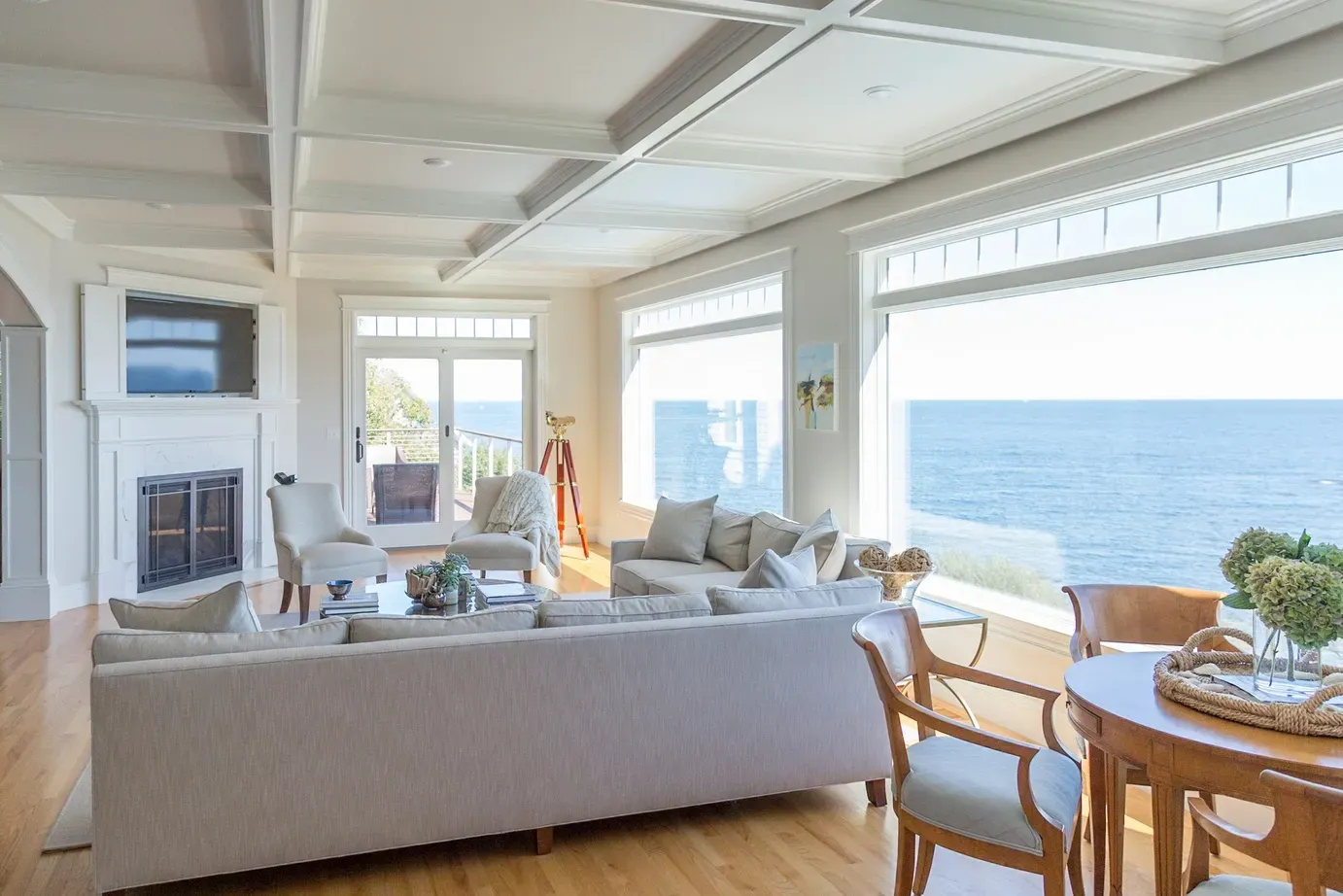 Living room and dining table overlooking the ocean