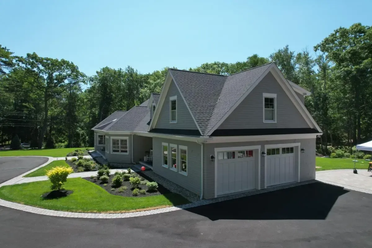 Aerial view of the Shore Road house, garage, and driveway