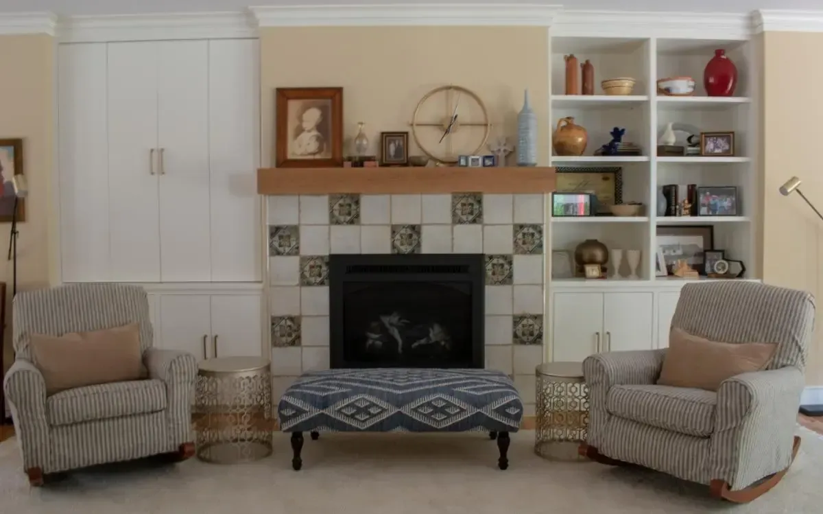 Pair of rocking chairs beside the living room fireplace