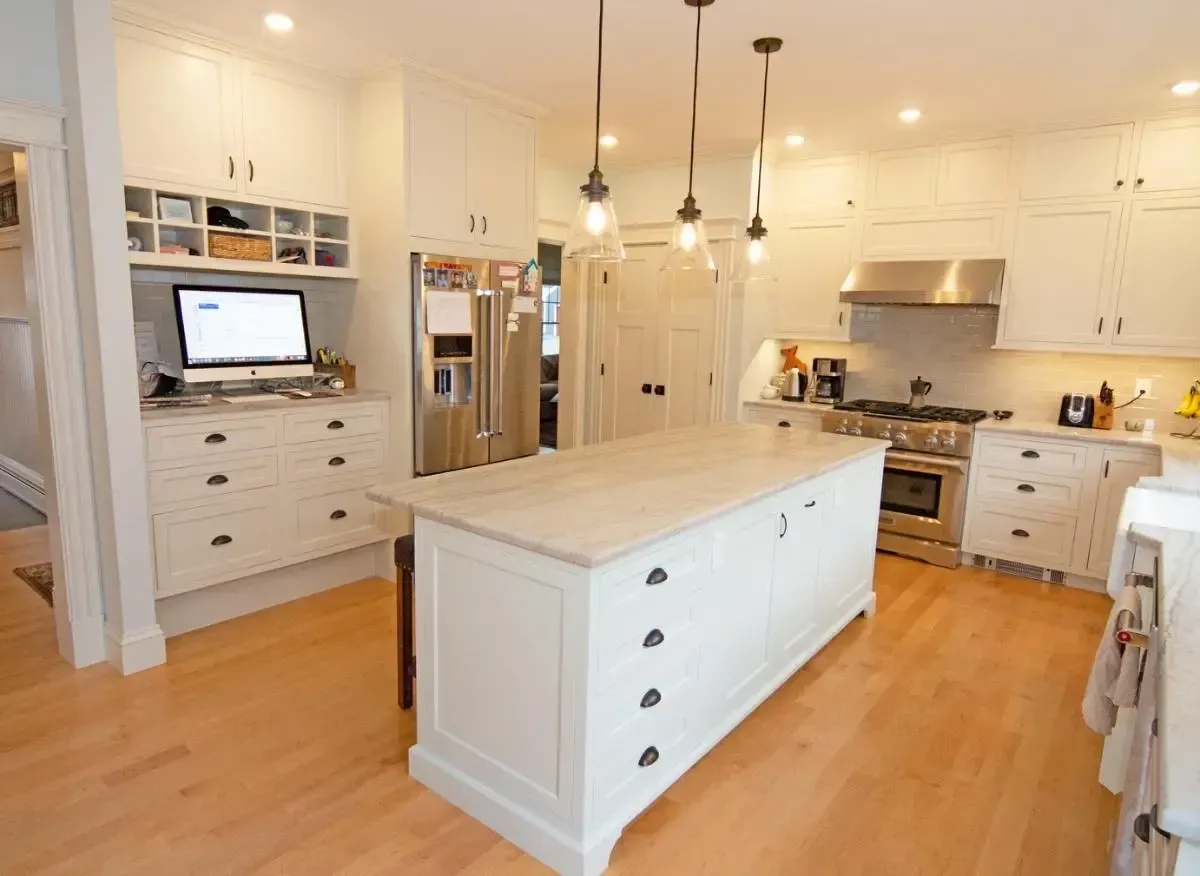 Kitchen island with a laptop set on the counter