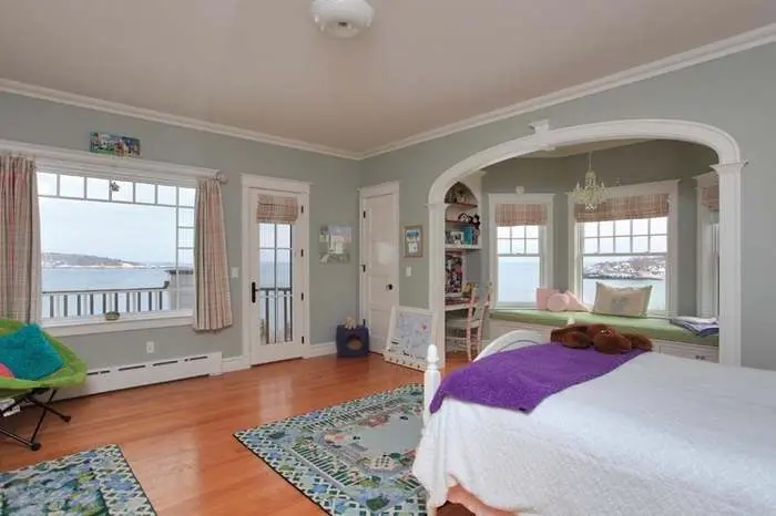 Bedroom with an arched opening and adjoining sitting room